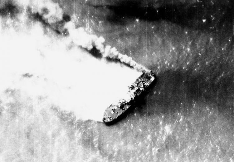 A North Vietnamese Shantou-class gunboat burns near Hon Ne Island